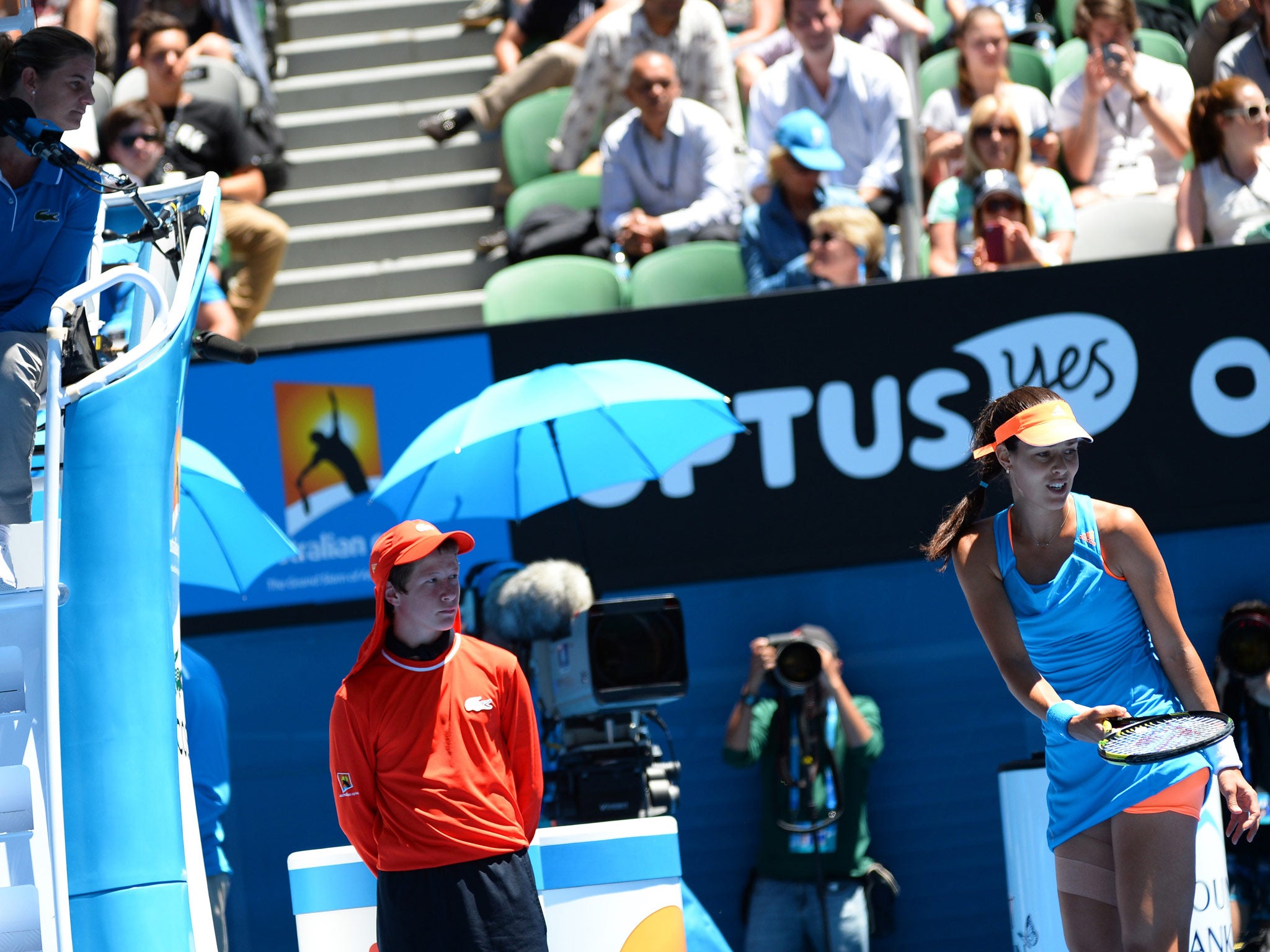 Ana Ivanovic of Serbia speaks to the umpire during her quarter-final defeat to Eugenie Bouchard of Canada