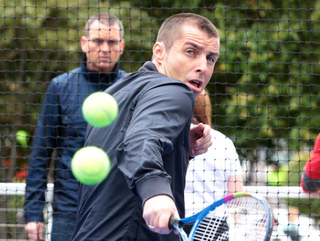 Liam Gallagher battles Aussie Open heatwave with freshly shaved head (and bomber jacket) in bizarre tennis-related PR stunt