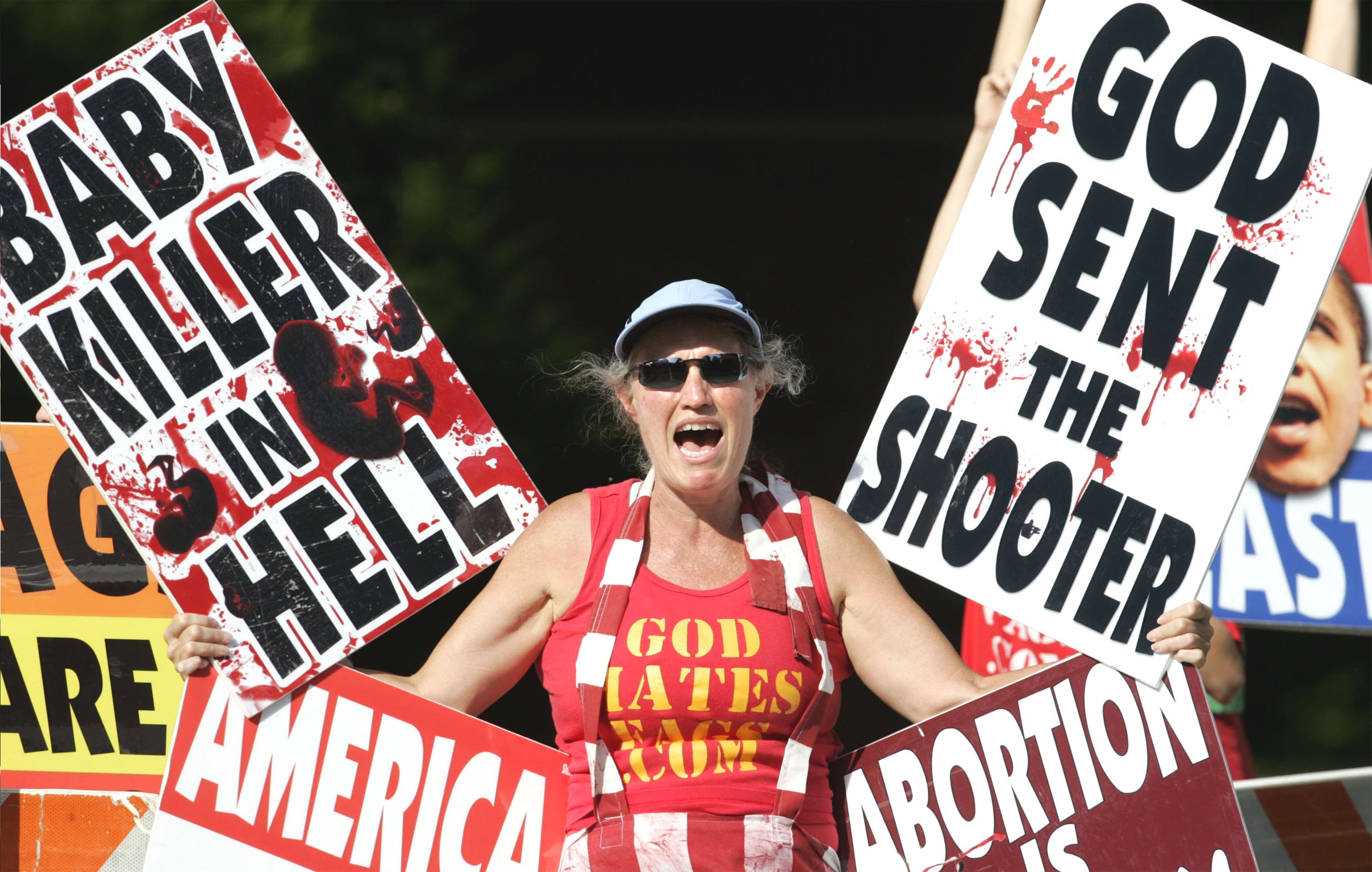 A protest at the funeral of Dr George Tiller at College Hill United Methodist Church in Wichita, Kansas in 2009