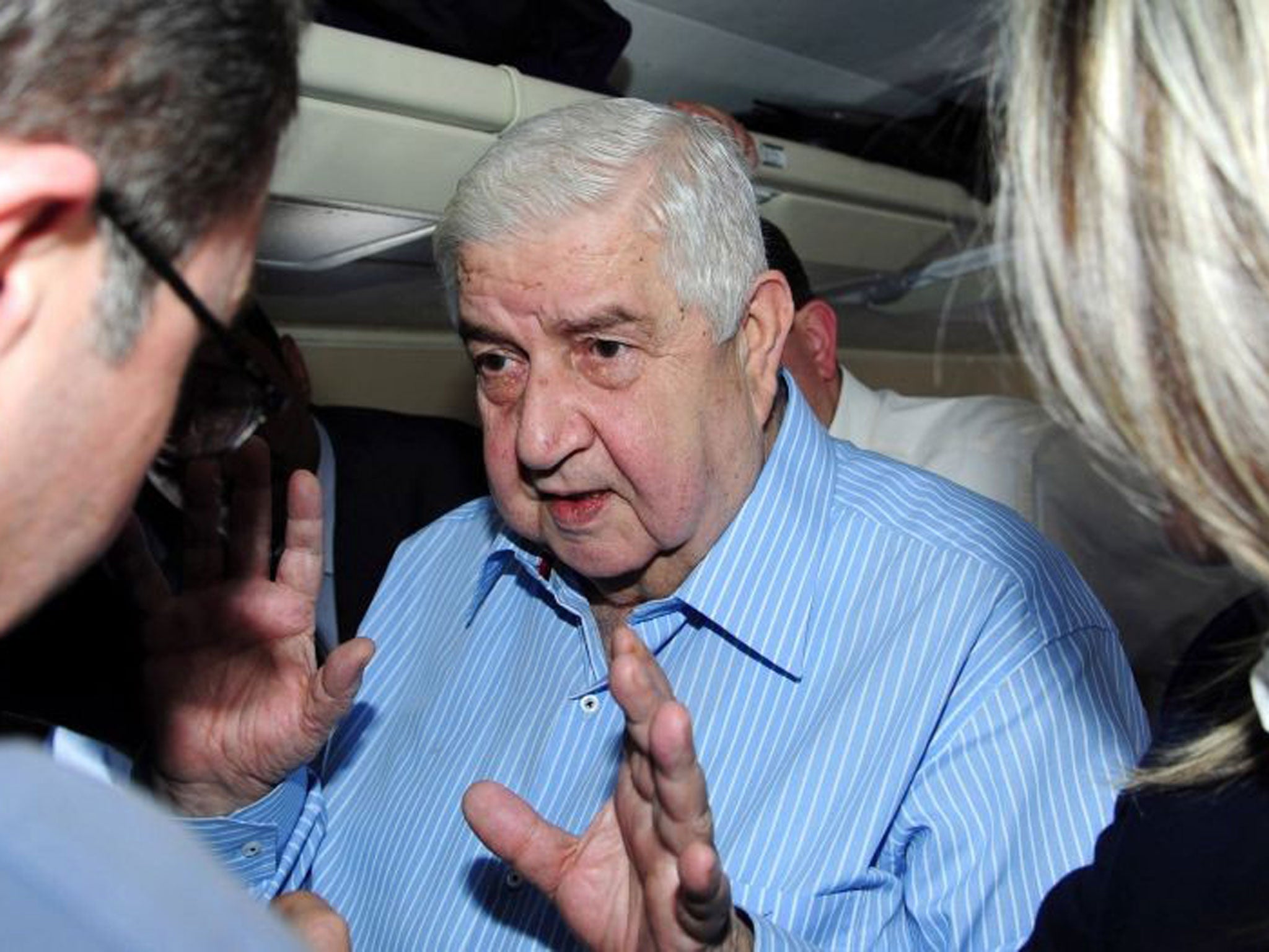 Syrian Foreign Minister Walid Muallem, head of the Syrian official delegation, arriving in Switzerland for the UN peace talks (Getty)