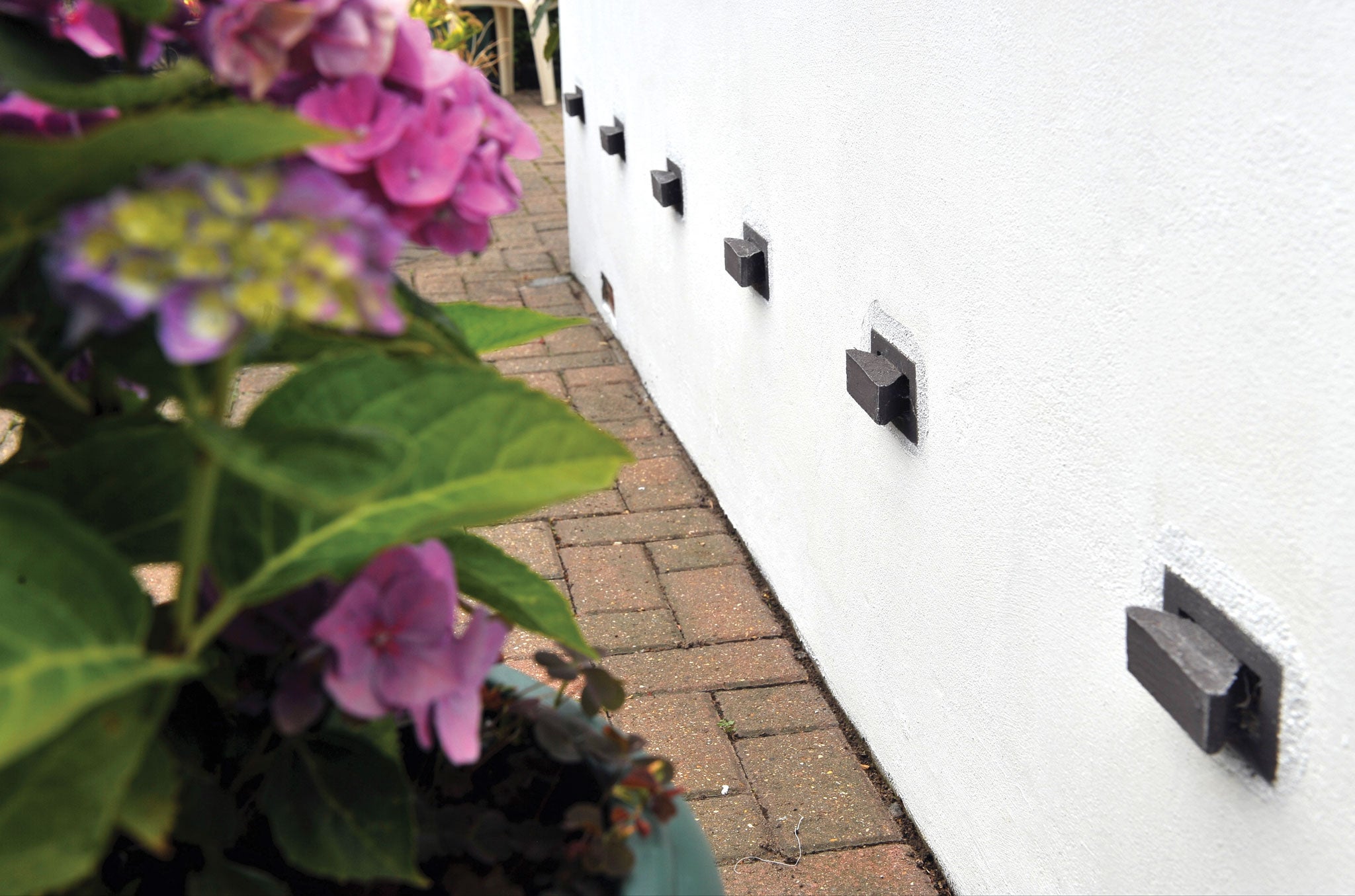 Prevent damp in your home with the Schrijver Damp Control System. Unlike traditional methods, the Schrijver system works via a series of elements fixed into the exterior walls. These inserts lower humidity levels and channel any internal moisture away from the building. Eco-friendly, discreet and easy to install, any stained patches on your walls should become a thing of the past. This award-winning technology offers a permanent solution and comes with a lifetime guarantee.