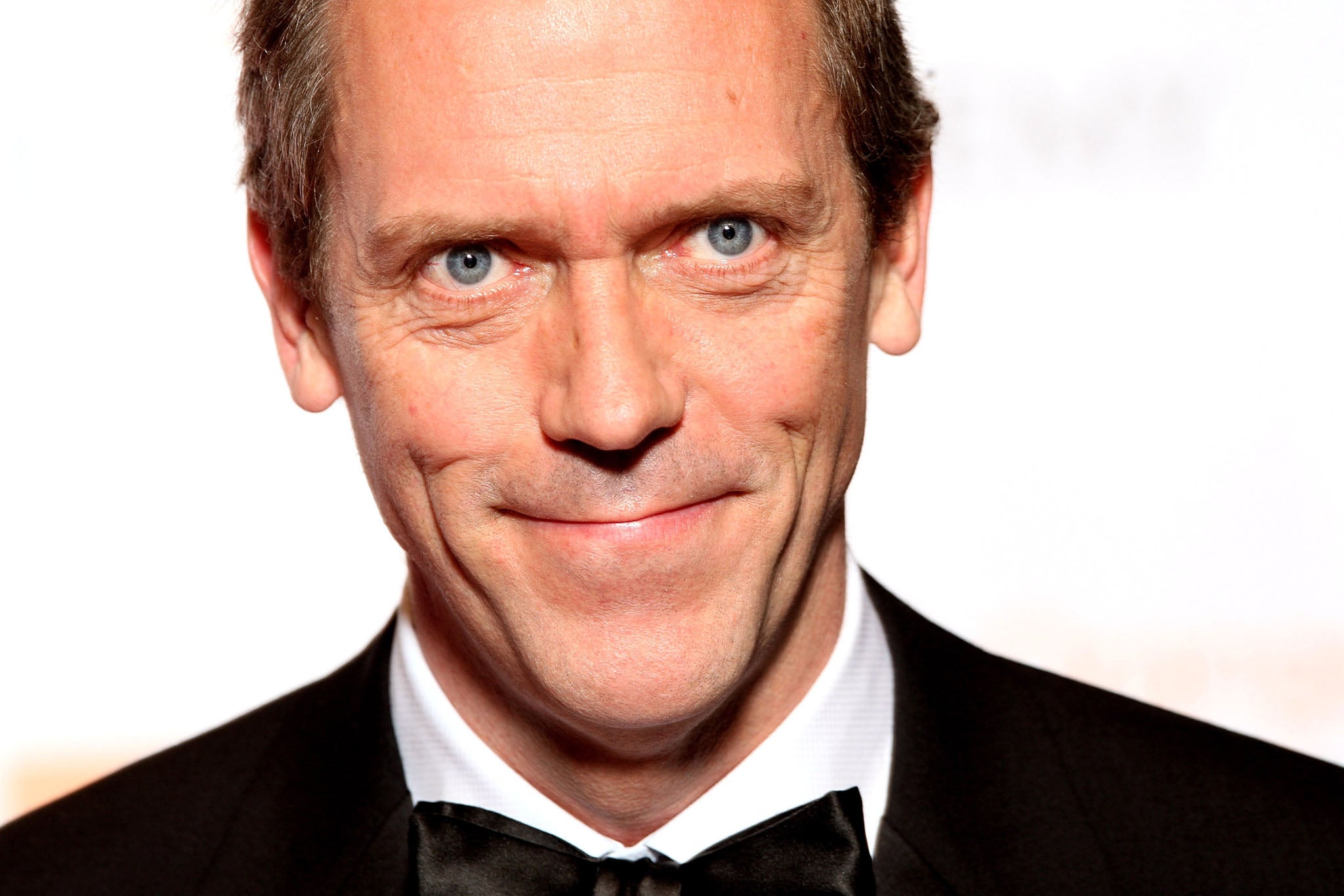 Insulted Russians hoping for an apology from Hugh Laurie over his call to boycott their “oven cleaner” vodka could be waiting some time.