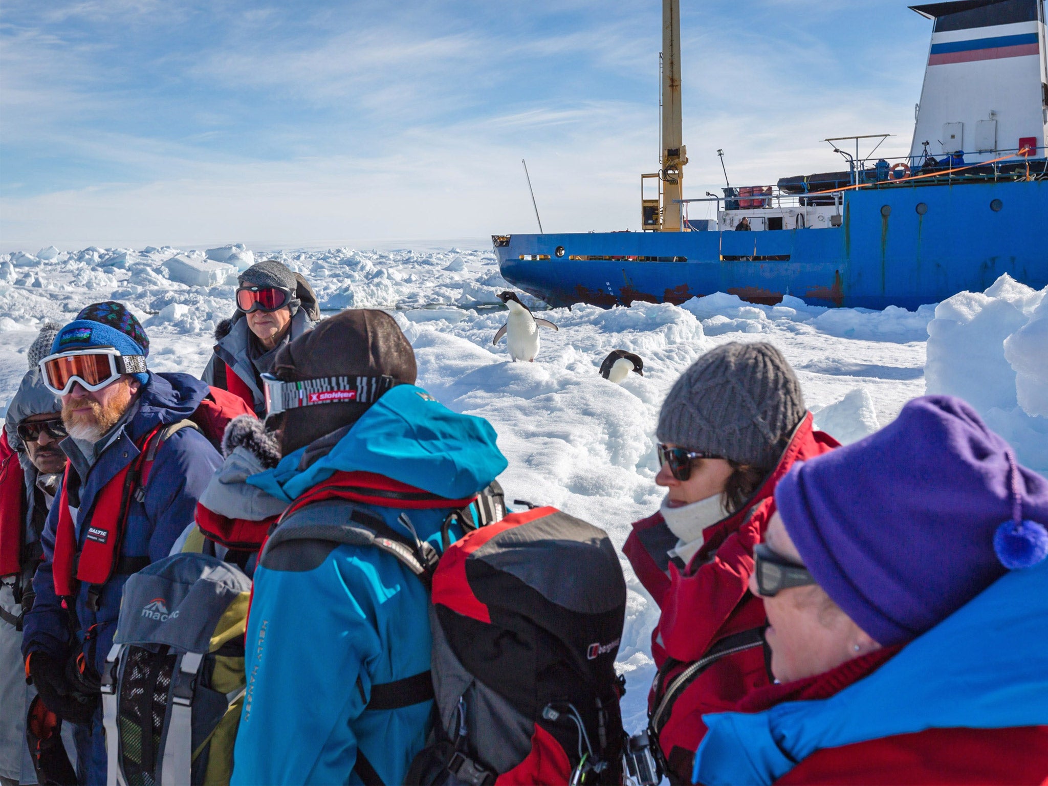 Passengers from the MV Akademik Shokalskiy wait for a helicopter after finally disembarking earlier this month (Getty)