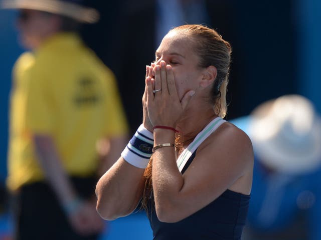 Dominika Cibulkova celebrates after beating Agnieszka Radwanska to progress to the Australian Open final