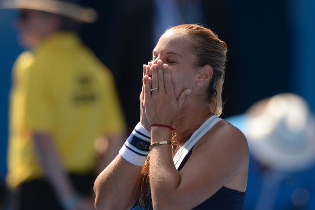 Dominika Cibulkova celebrates after beating Agnieszka Radwanska to progress to the Australian Open final