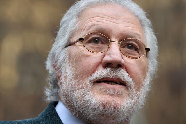 Former radio and TV presenter Dave Lee Travis, real name David Patrick Griffin, arrives at Southwark Crown Court in London