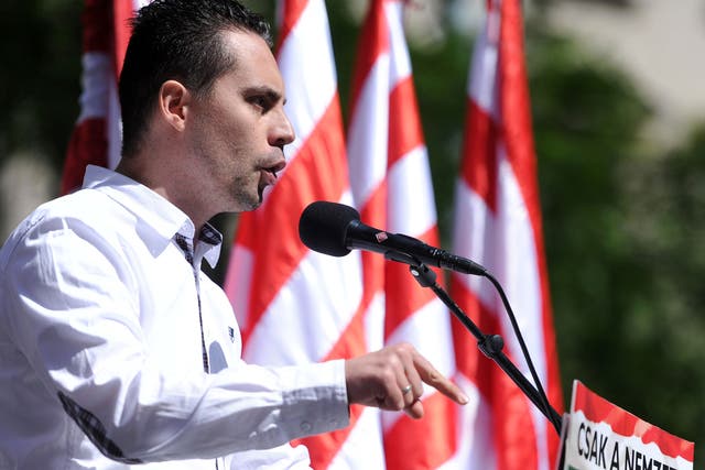 Gabor Vona delivers a speech during a demonstration of the nationalist party in Budapest. Campaign groups want to see Home Secretary Theresa May enforce a ban on Mr Vona entering the UK.