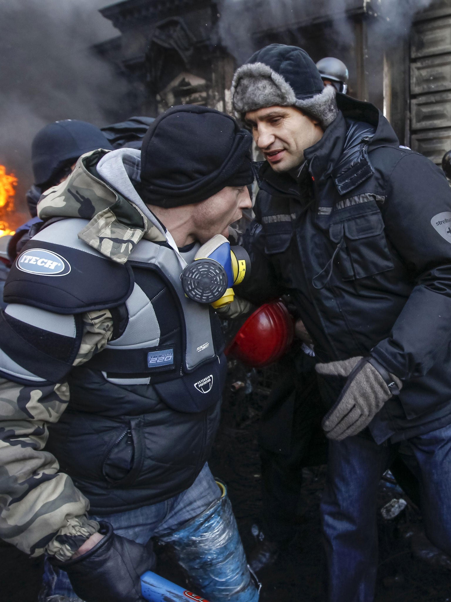 Opposition leader Vitali Klitschko (right) with a one of the Kiev protesters
