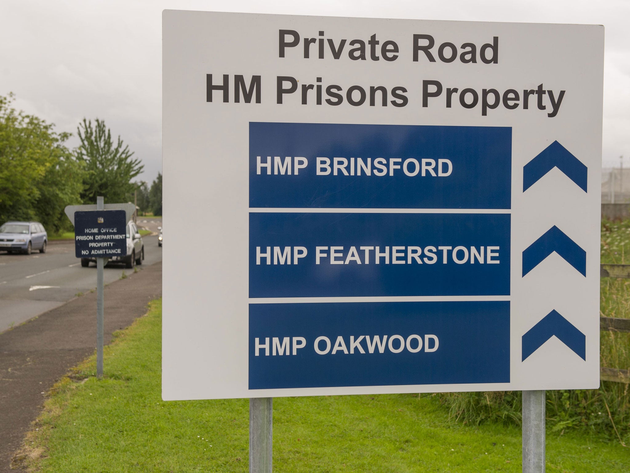 Road sign to the entrance of HMP Featherstone, HMP Brinsford and HMP Oakwood; a nine-hour disturbance at Oakwood prison has been described as a 'full scale riot'