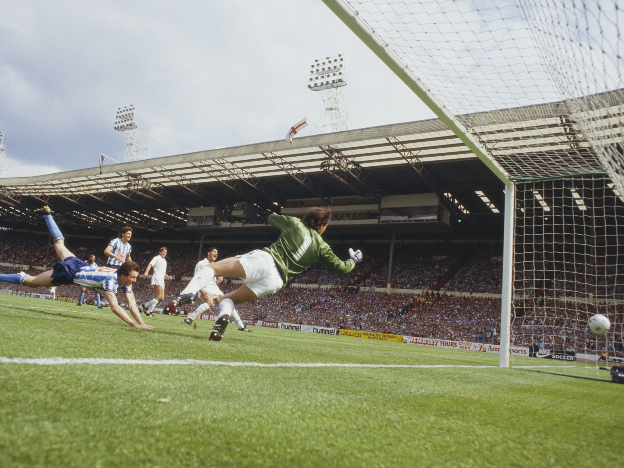 Keith Houchen heads Coventry's second goal past Tottenham goalkeeper Ray Clemence in the 1987 final