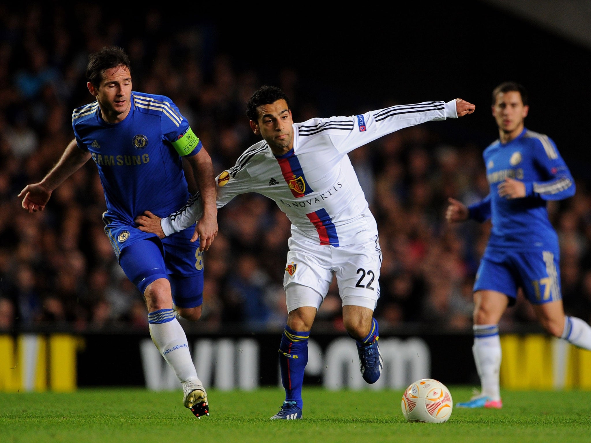 Mohamed Salah, of Basel, holds off Chelsea's Frank Lampard during their Europa League semi final second leg at Stamford Bridge last May