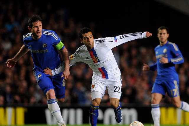 Mohamed Salah, of Basel, holds off Chelsea's Frank Lampard during their Europa League semi final second leg at Stamford Bridge last May