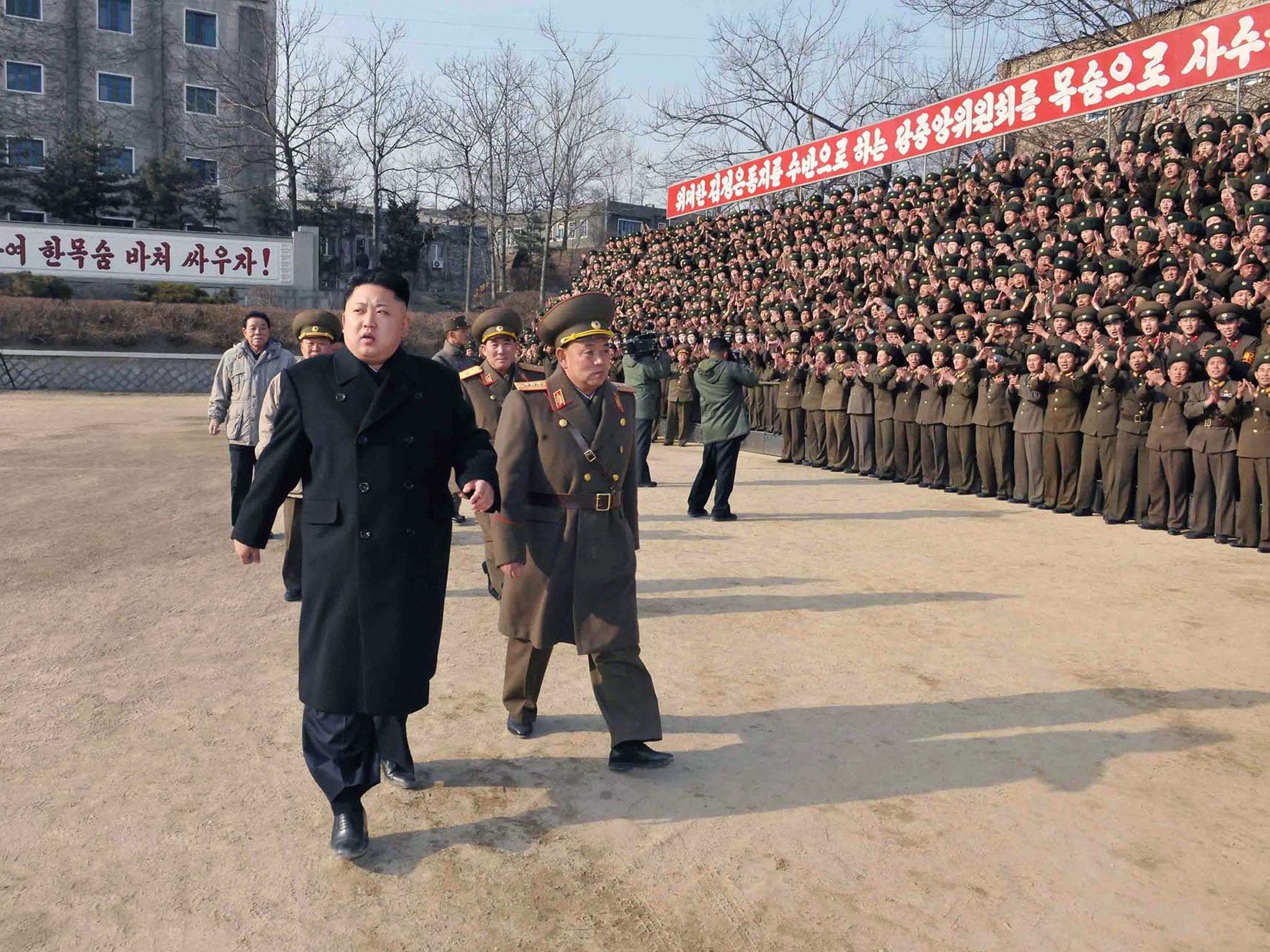 North Korean leader Kim Jong-Un (left) inspects the command of Korean People's Army.