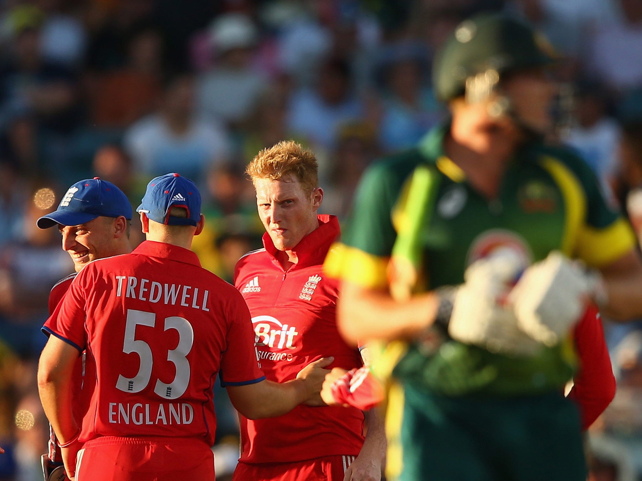 England celebrate taking the wicket of James Faulkner of Australia