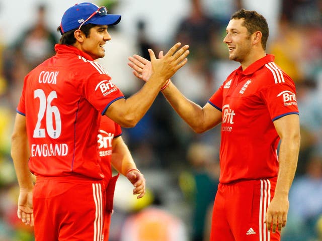 Alastair Cook and Tim Bresnan of England celebrate after defeating Australia during game four of the One Day International series between Australia and England