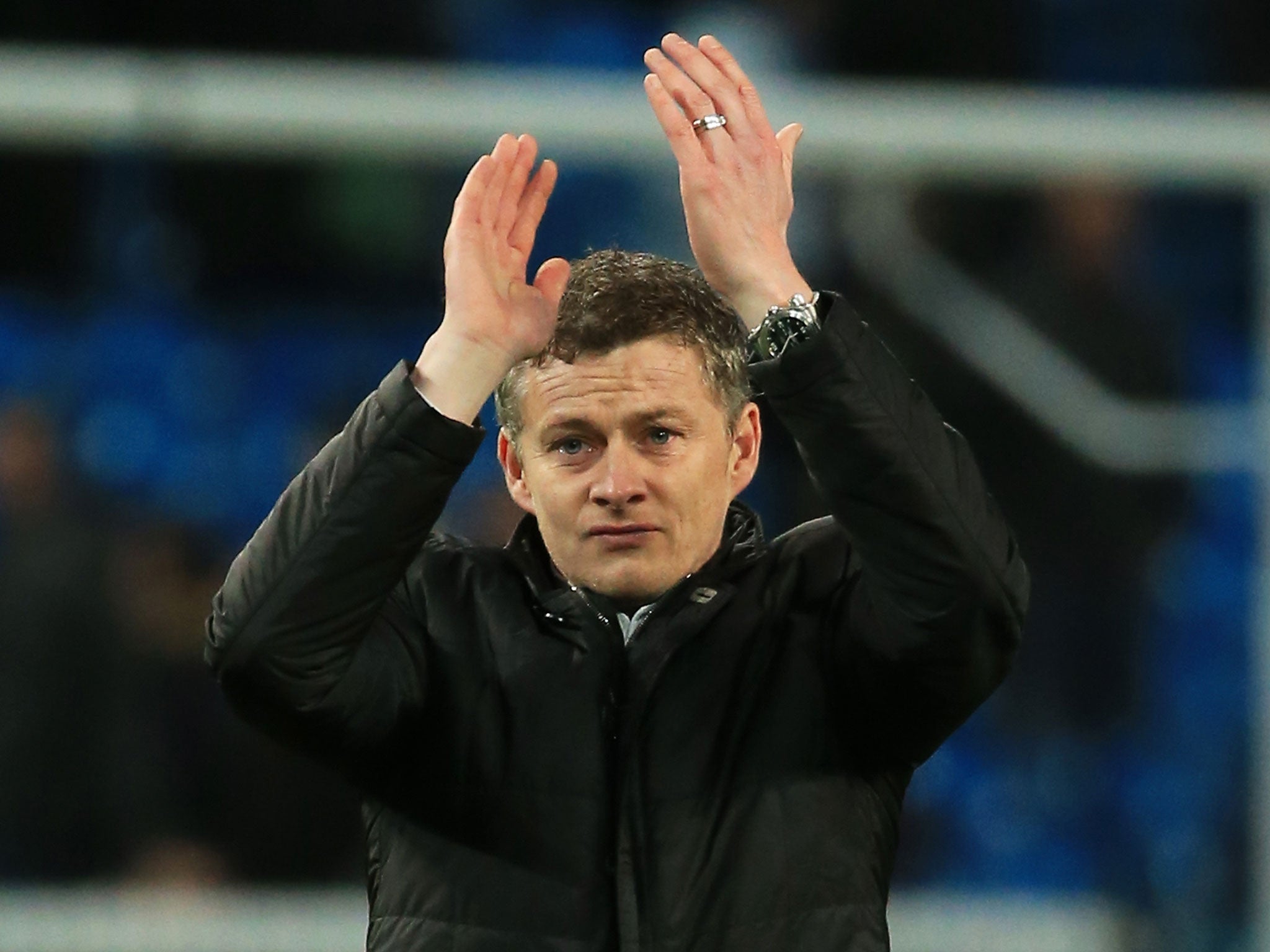 Cardiff manager Ole Gunnar Solskjaer applauds the fans