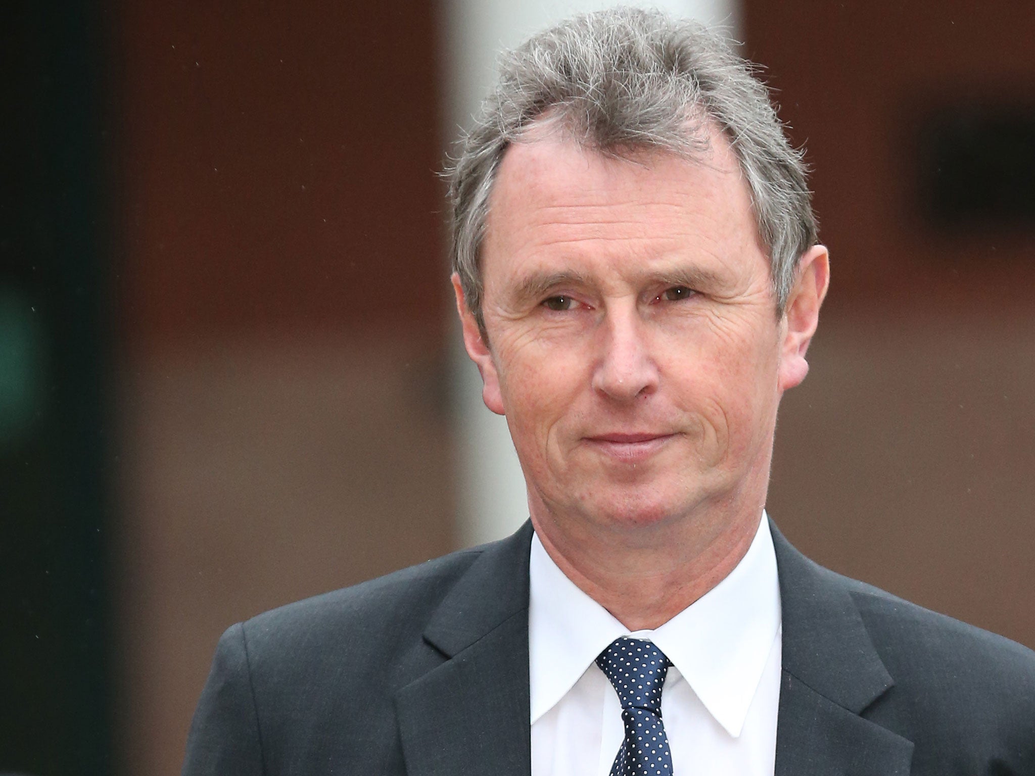 Former Deputy Speaker Nigel Evans leaves Preston Crown Court after his pre-trial hearing to face charges of sexual assault on January 24, 2014 in Preston, Lancashire.