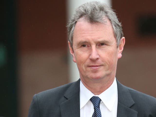 Former Deputy Speaker Nigel Evans leaves Preston Crown Court after his pre-trial hearing to face charges of sexual assault on January 24, 2014 in Preston, Lancashire. 