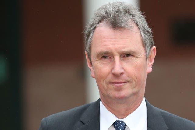 Former Deputy Speaker Nigel Evans leaves Preston Crown Court after his pre-trial hearing to face charges of sexual assault on January 24, 2014 in Preston, Lancashire. 