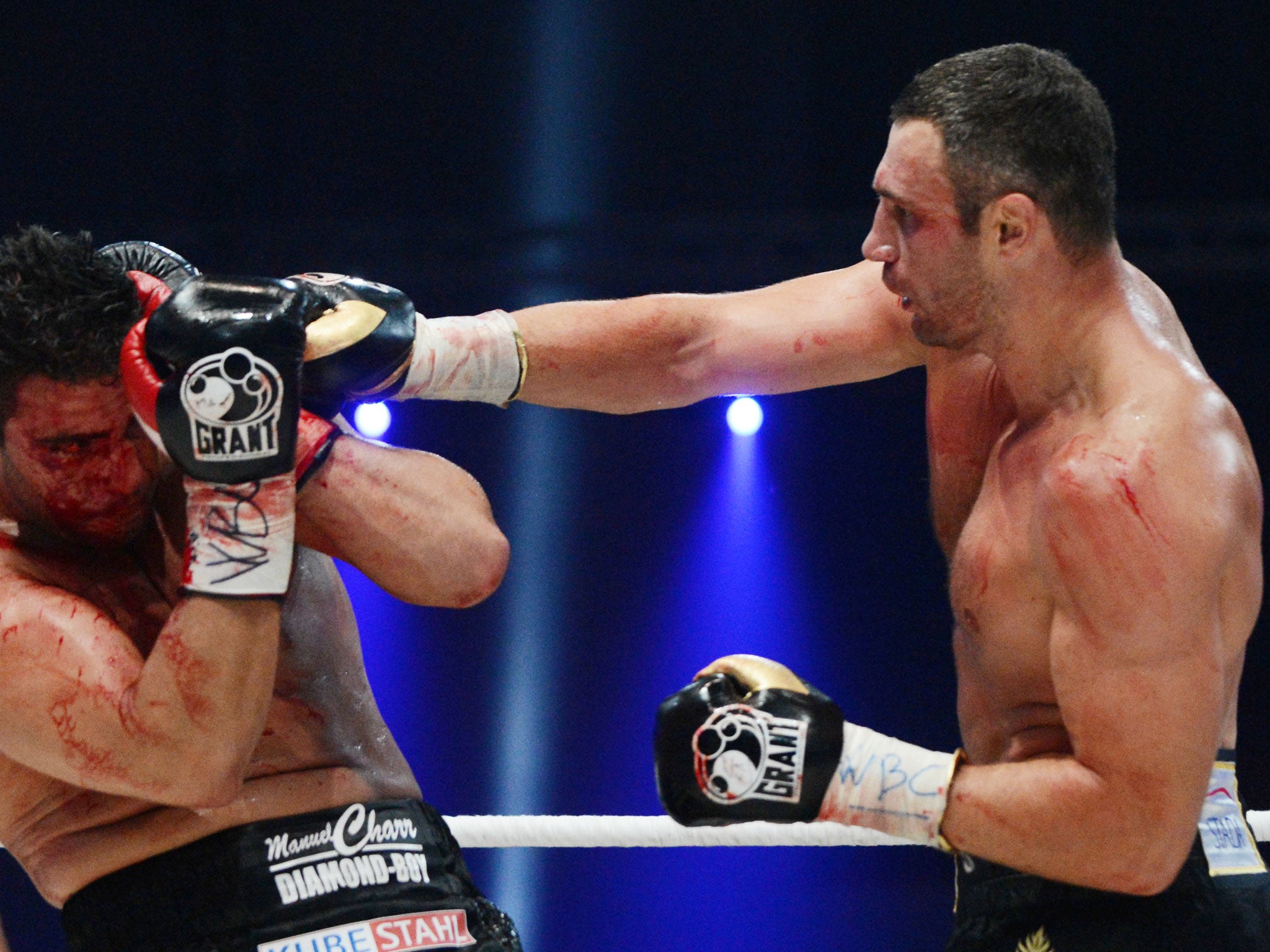 Vitali Klitschko fighting for the defense of his WBC heavyweight title against Germany's Manuel Charr in 2012