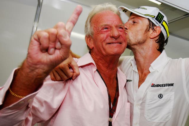 Button, left, with Jenson in Brazil after his son had won the 2009 F1 world title 