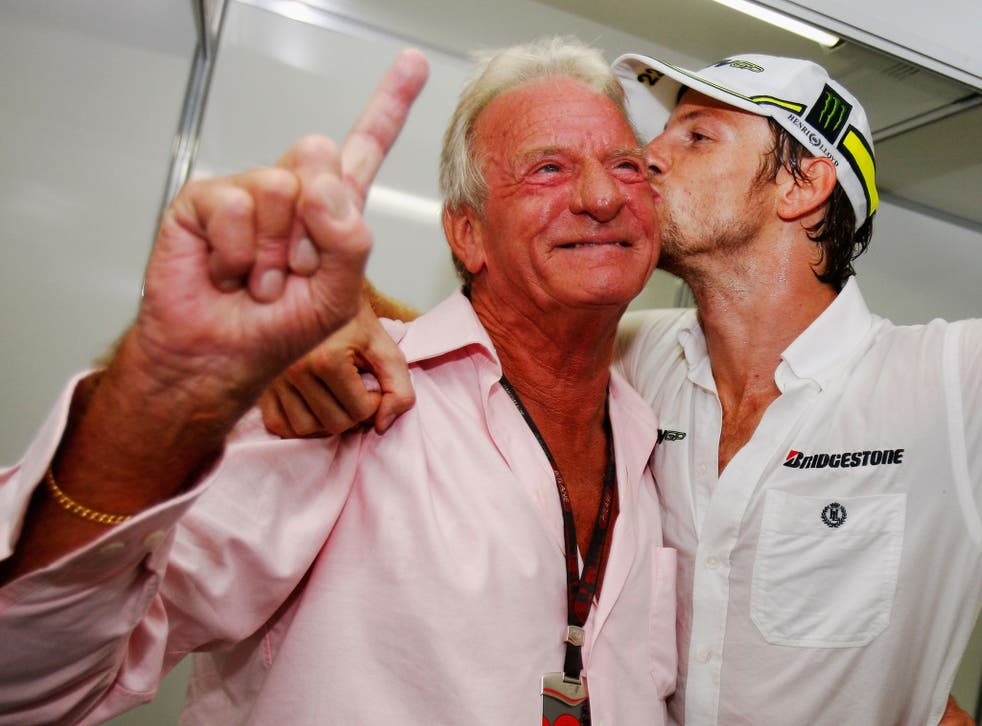 Button, left, with Jenson in Brazil after his son had won the 2009 F1 world title 