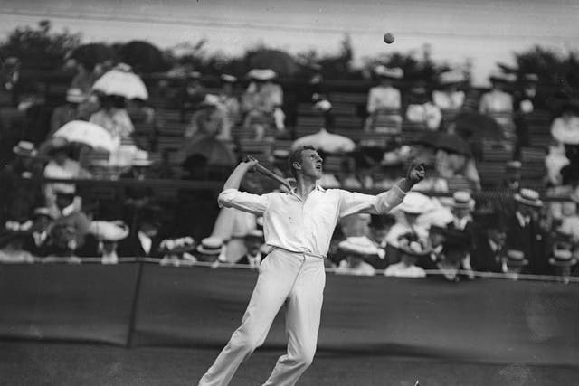 July 1908: Anthony Wilding of New Zealand in action during the tennis championships at Wimbledon