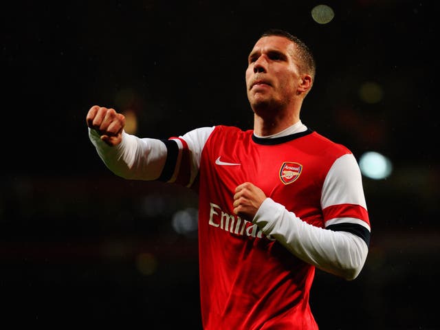 Lukas Podolski celebrates after scoring his team's second goal of the match (Getty Images)