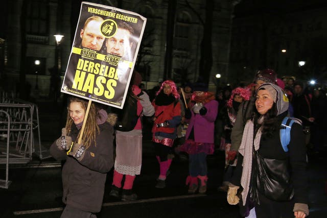 People take part in a protest against the staging of an annual ball hosted by an Austrian extreme right party in the centre of Vienna on January 24, 2014