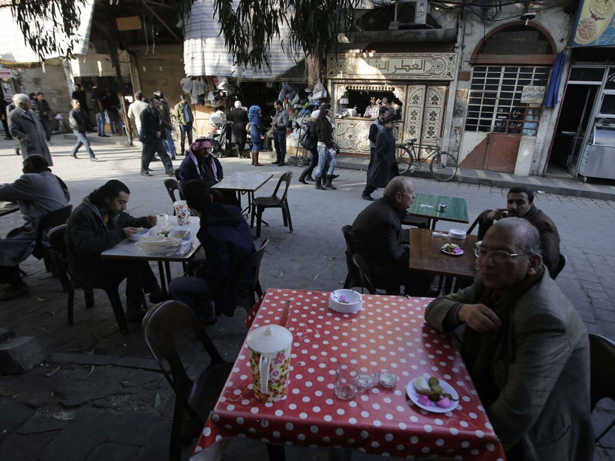 Table talk: A veneer of normality survives in some parts of Damascus