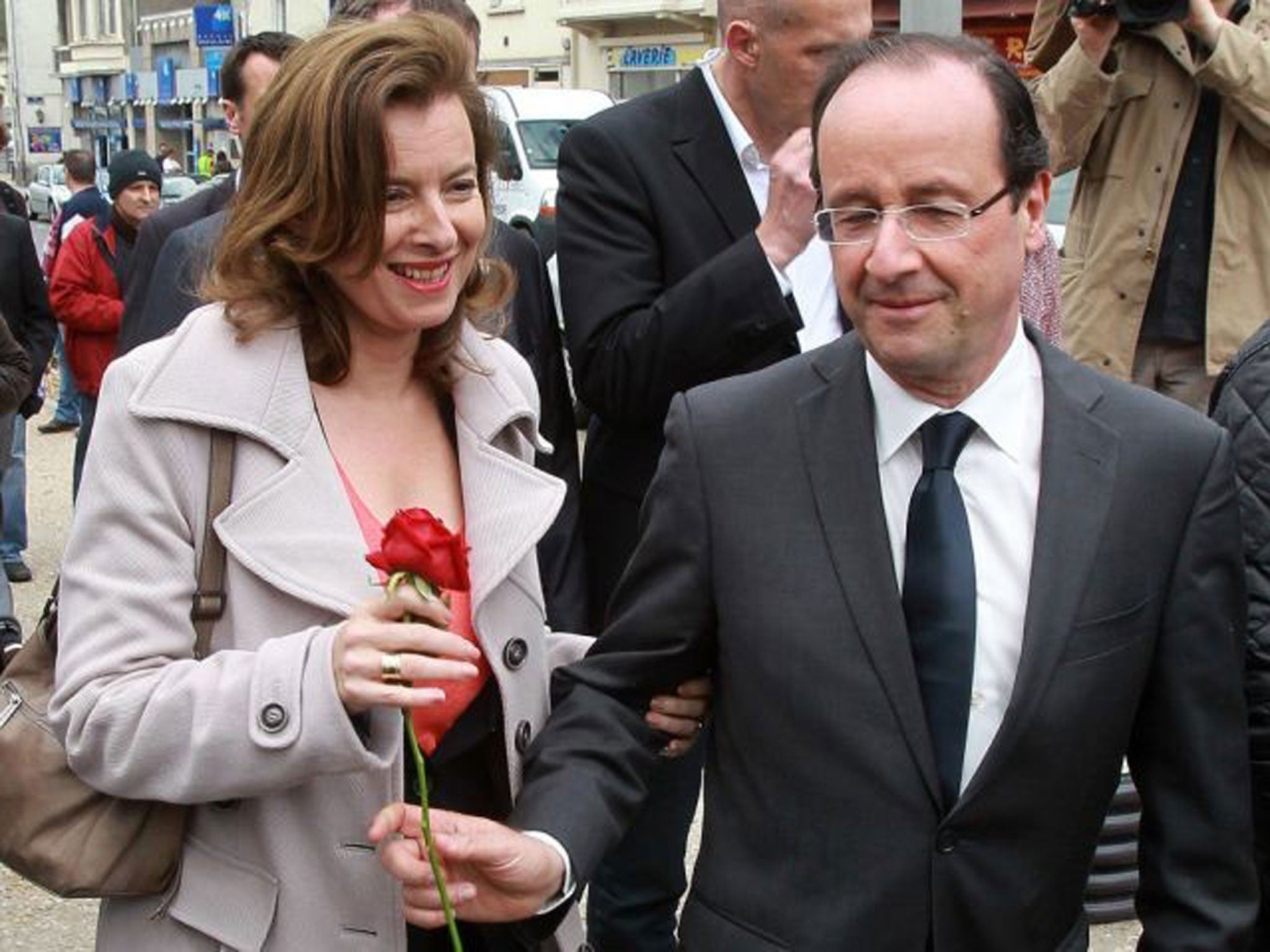 Hollande offers a rose to his then-companion Valerie Trierweiler, in Tulle, southwestern France back in 2012