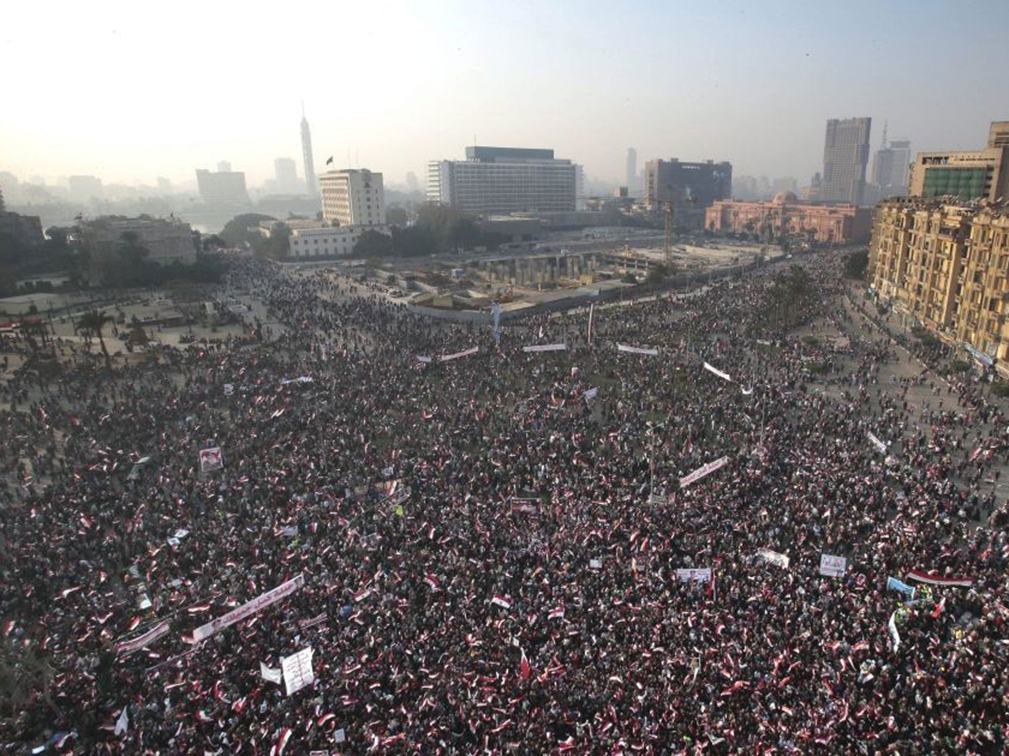 Tahrir Square in Cairo is now enclosed by towering metal gates to avoid protests