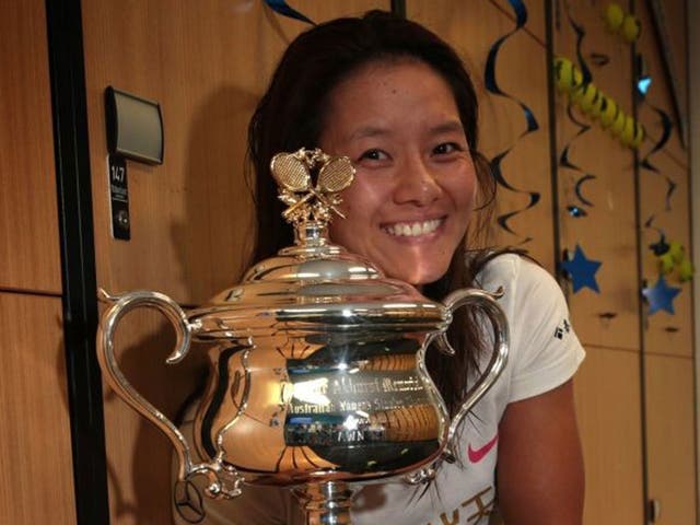 All smiles: China’s Li Na celebrates with her second Grand Slam trophy 