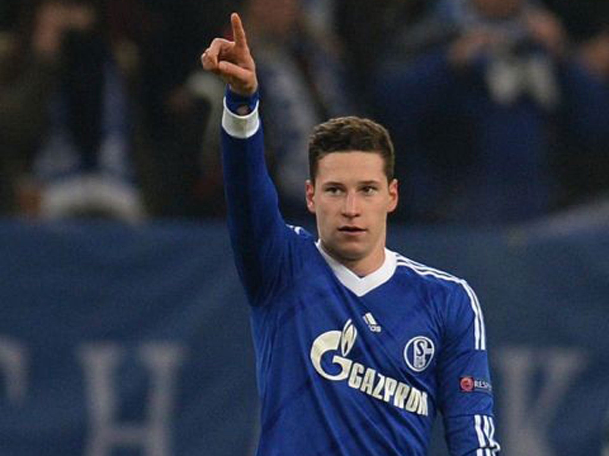 Schalke's midfielder Julian Draxler celebrates after scoring