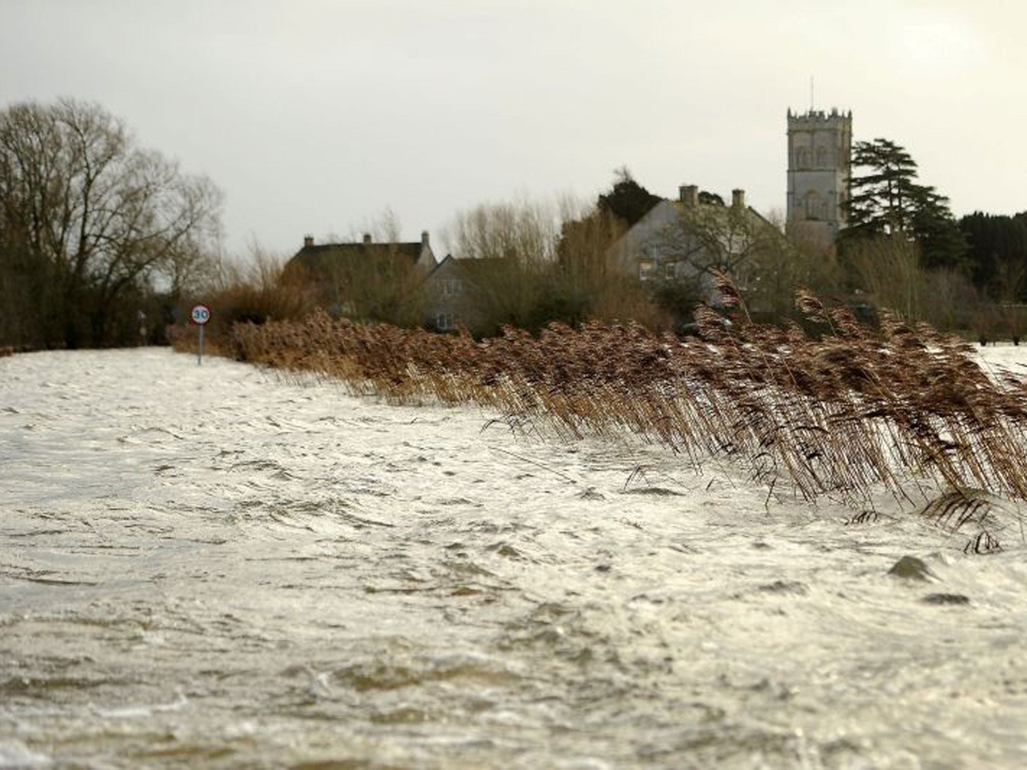 View from a road of of flood water surrounding the village of Muchelney in the Somerset levels, Sunday 26 January 2014