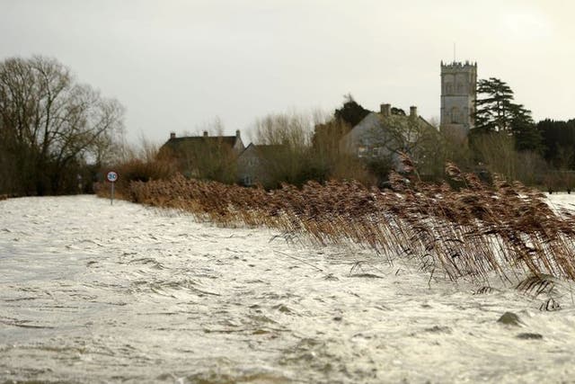 View from a road of of flood water surrounding the village of Muchelney in the Somerset levels, Sunday 26 January 2014