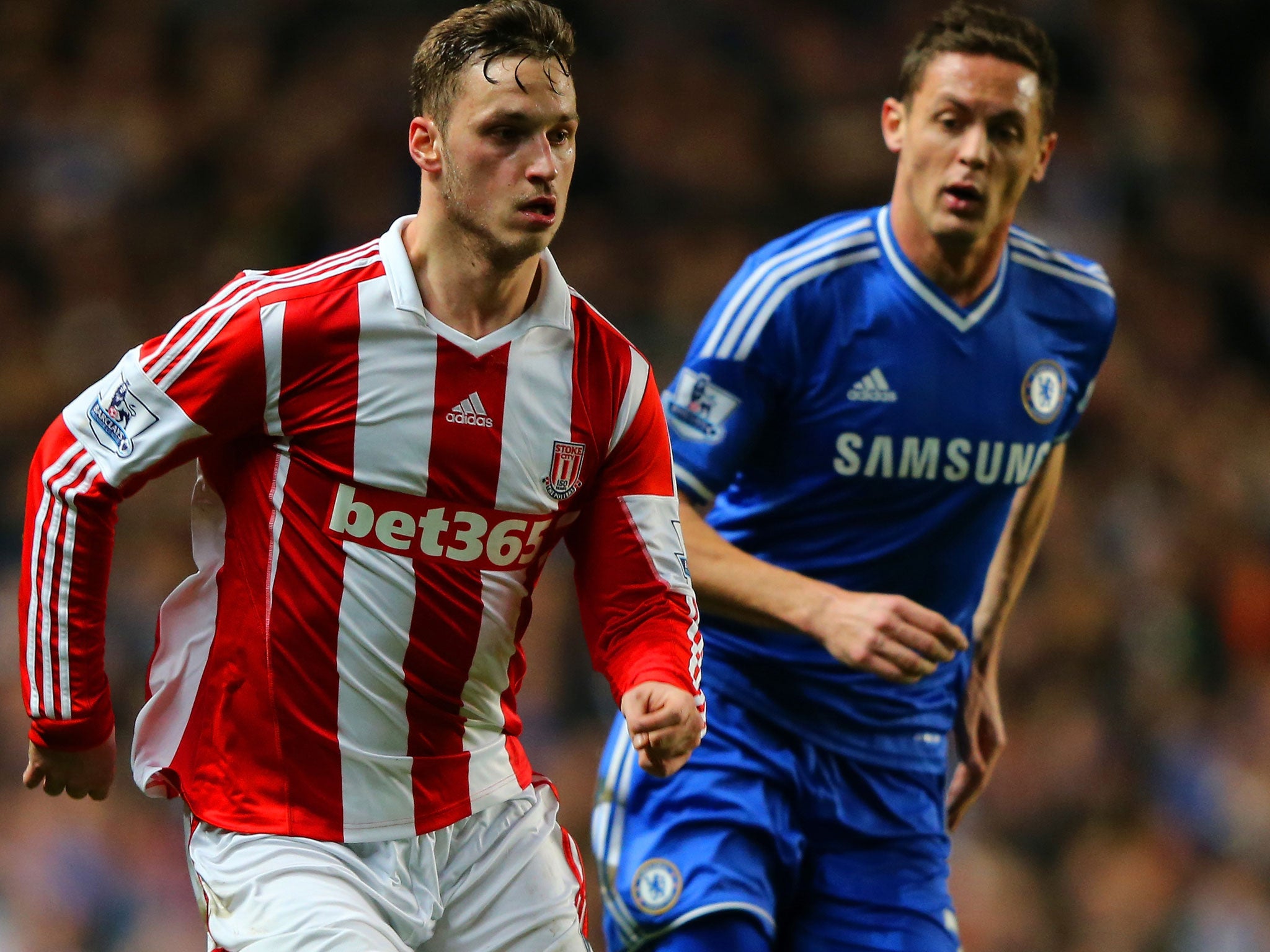 Marko Arnautovic fends off Chelsea's Nemanja Matic