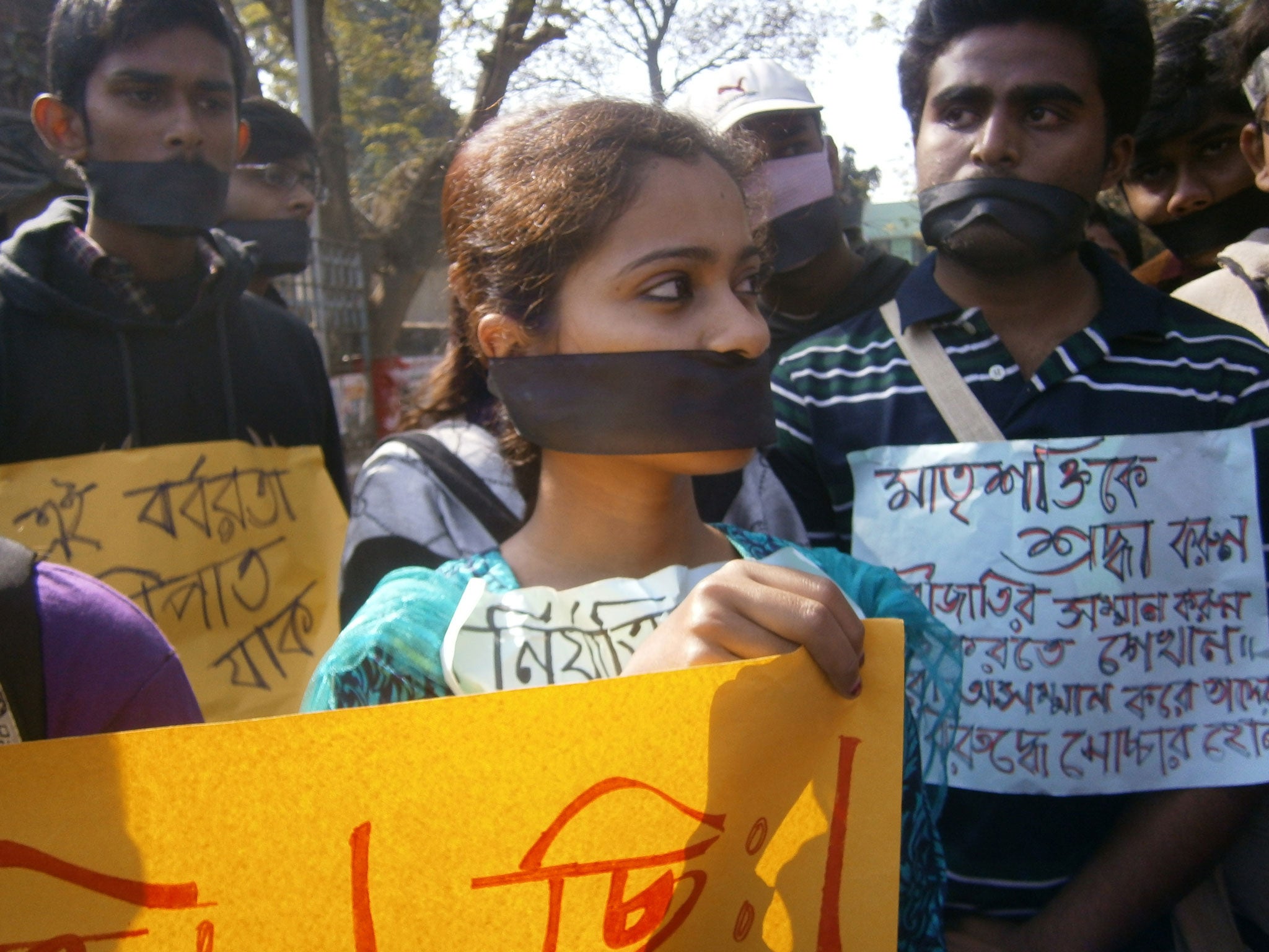 Student protesters outside a Suri hospital where a rape victim is being treated