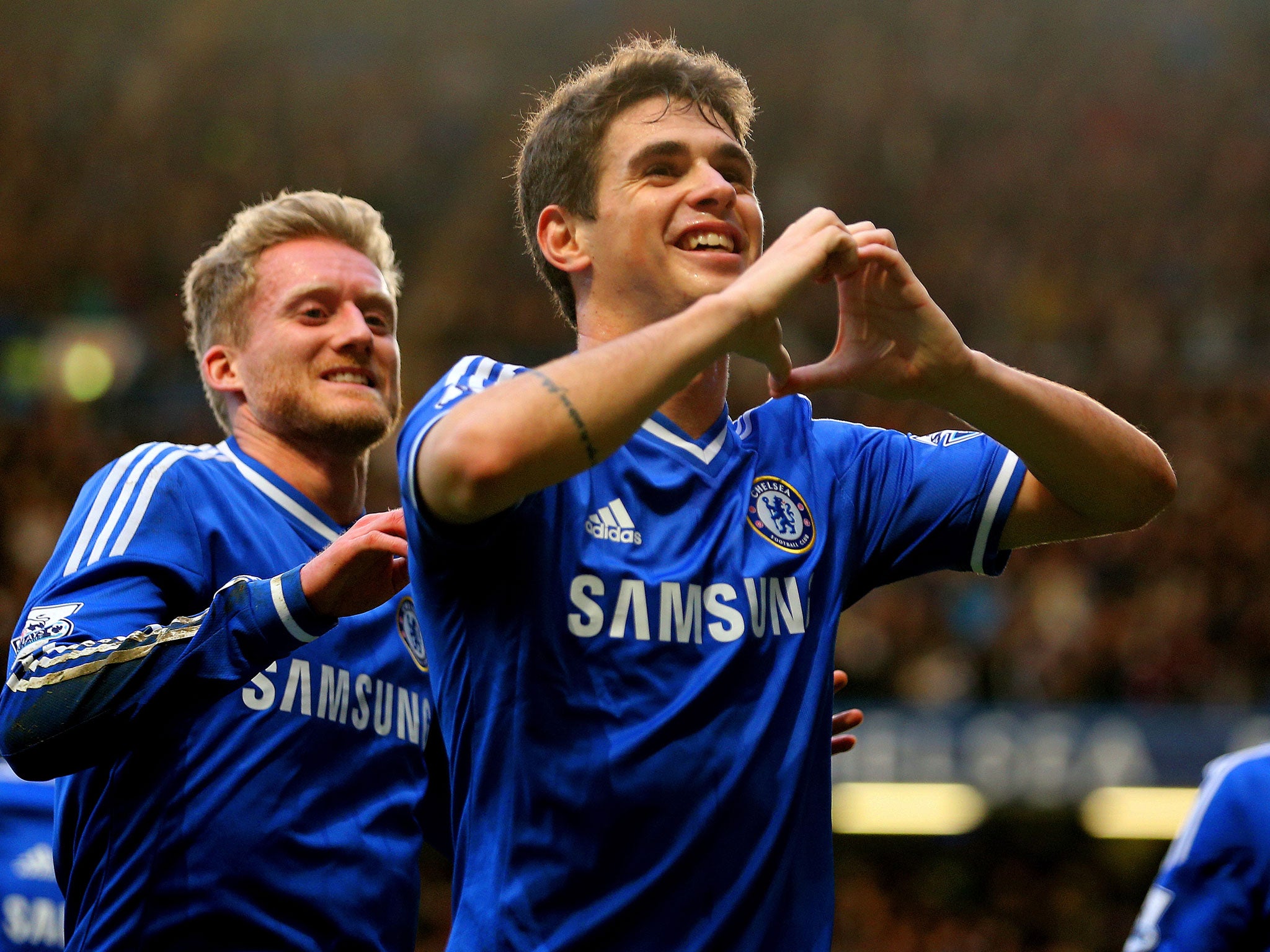 Oscar (right) celebrates his winner with Andre Schurrle