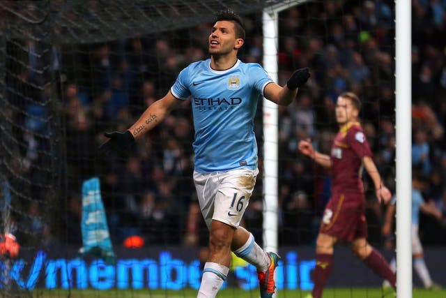 Sergio Aguero celebrates one of his goals in a second-half hat-trick