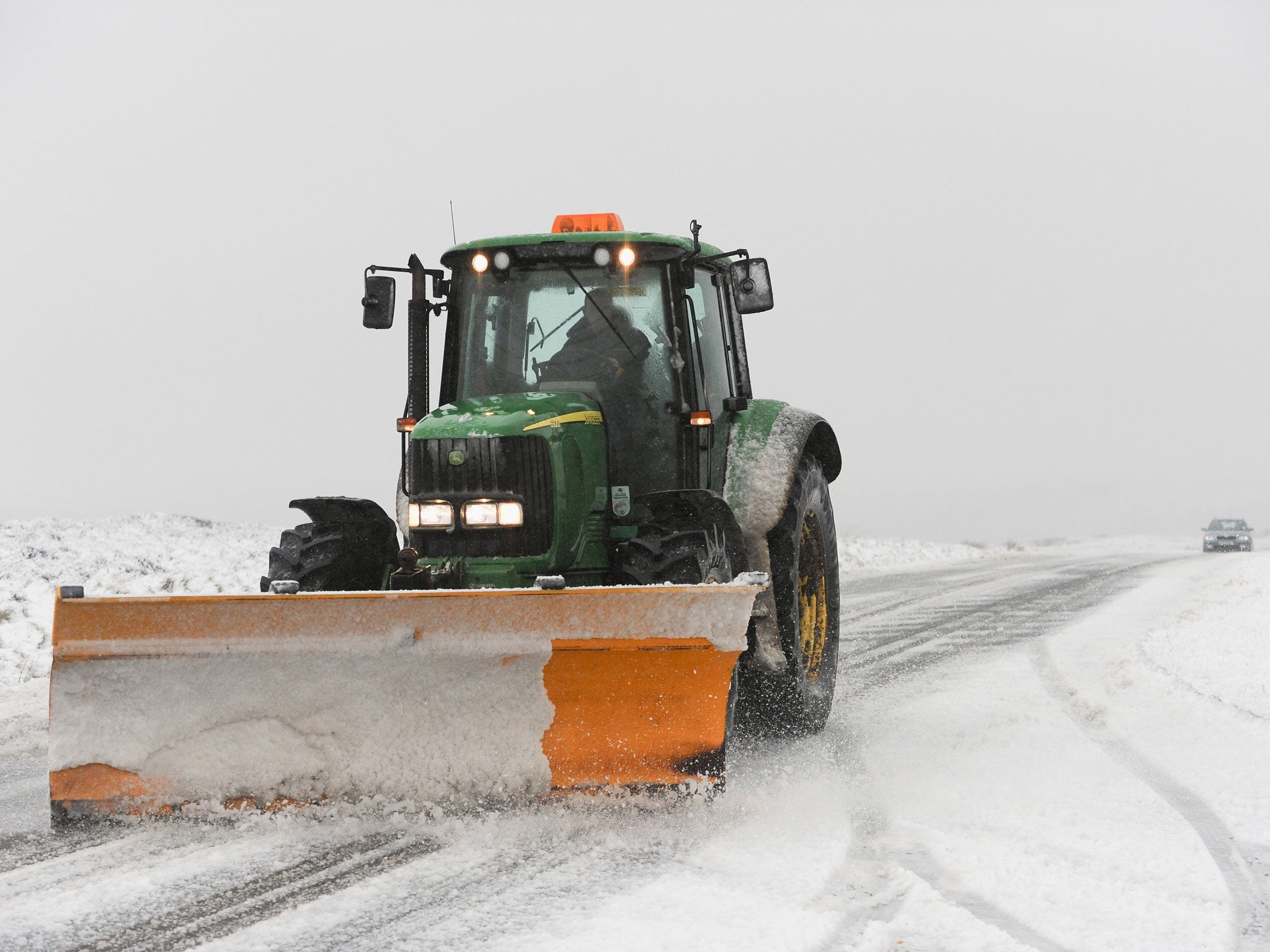 A snowplough driver saw the car in a ditch and alerted police