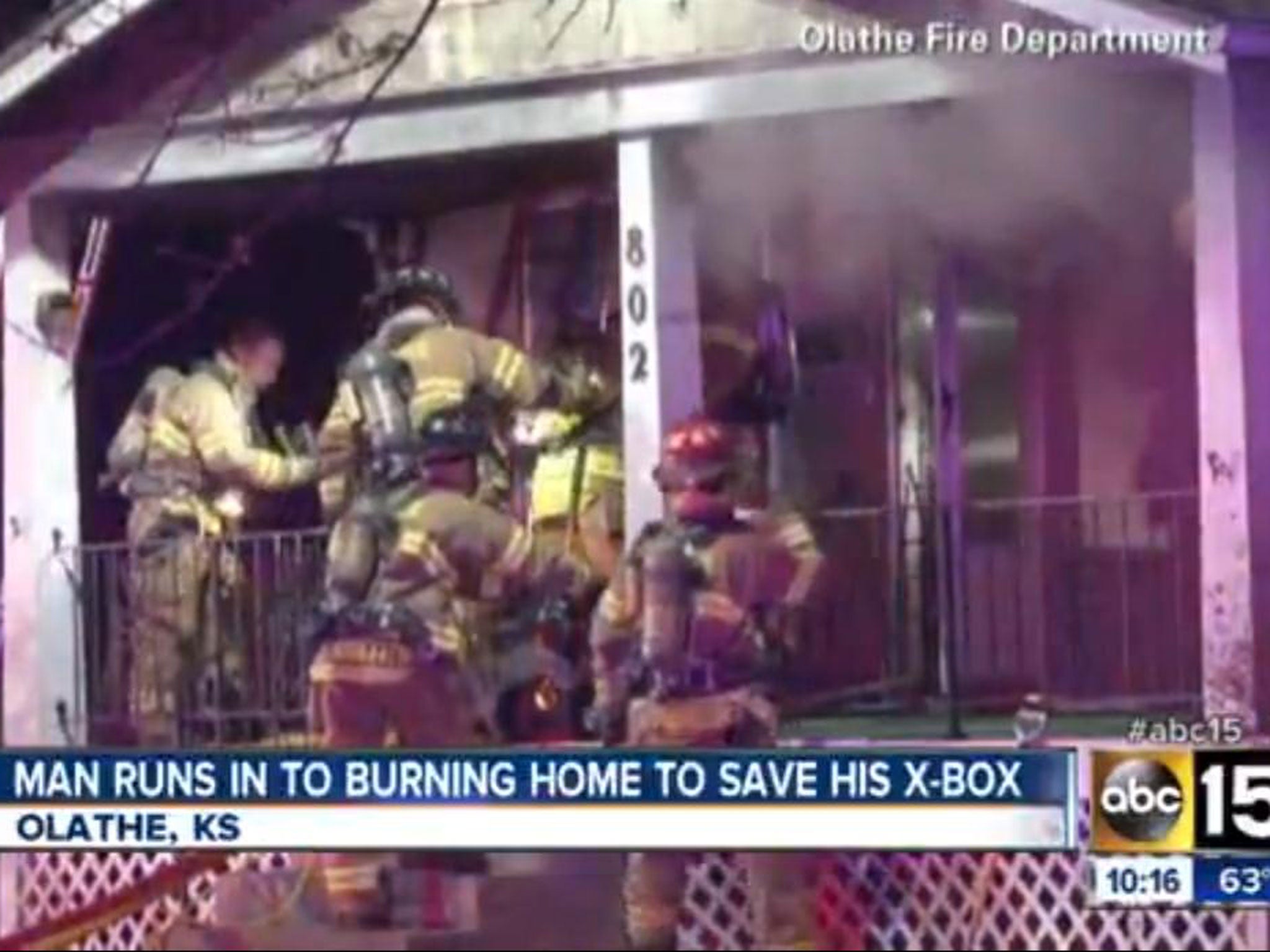 A Kansas man risked his life by running back into a burning house to retrieve his X-box