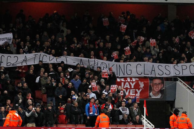 Liverpool fans protest against Arsenal's ticket prices at the Emirates Stadium in January 2013