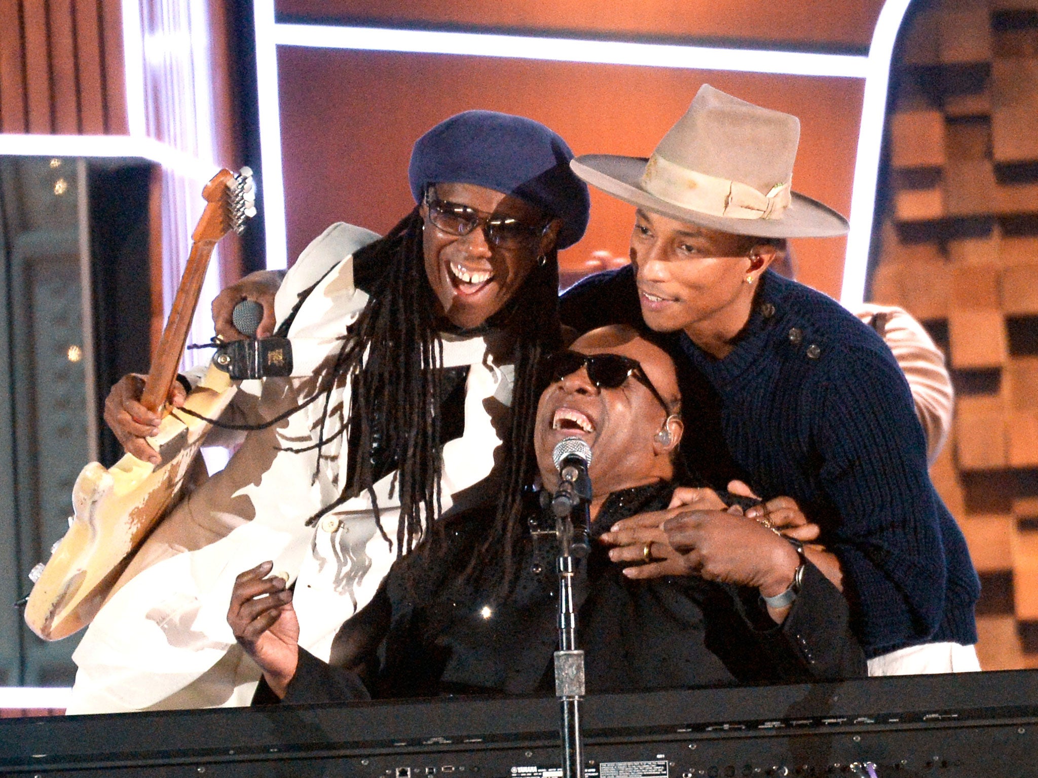 Musicians Nile Rodgers, Stevie Wonder and Pharrell Williams perform onstage