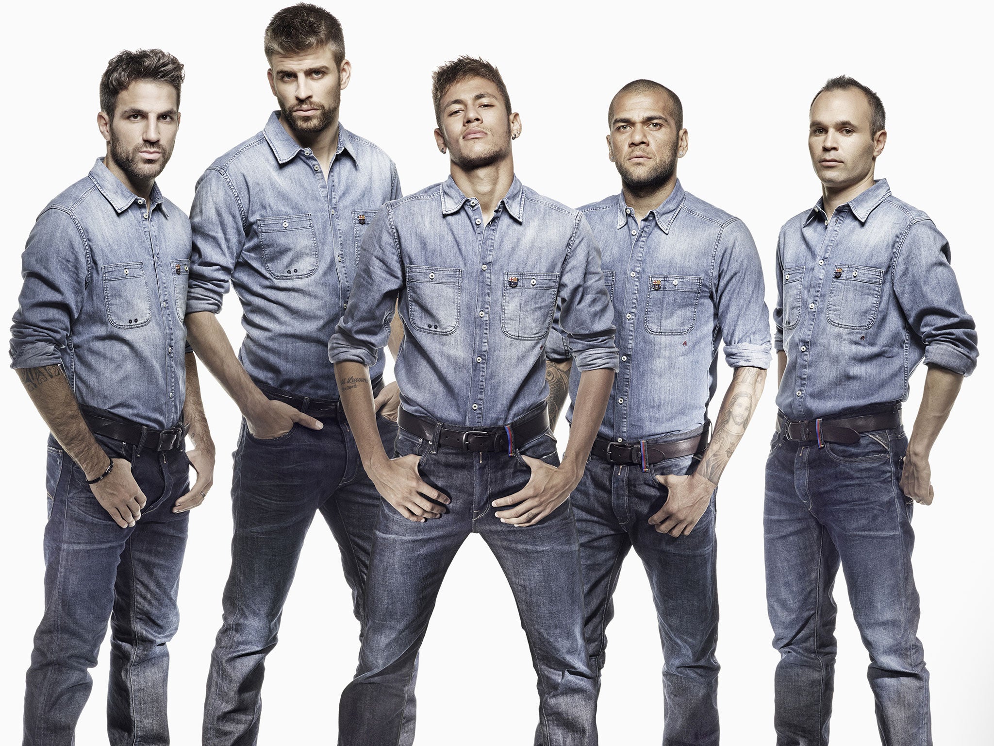 (l-r) Cesc Fabregas, Gerard Pique, Neymar, Dani Alves, Andre Iniesta pose in their double denim