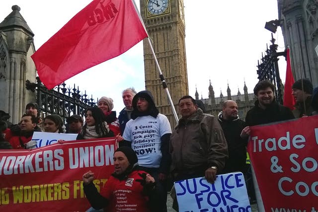 3 Cosas workers form a picket line at the Houses of Parliament