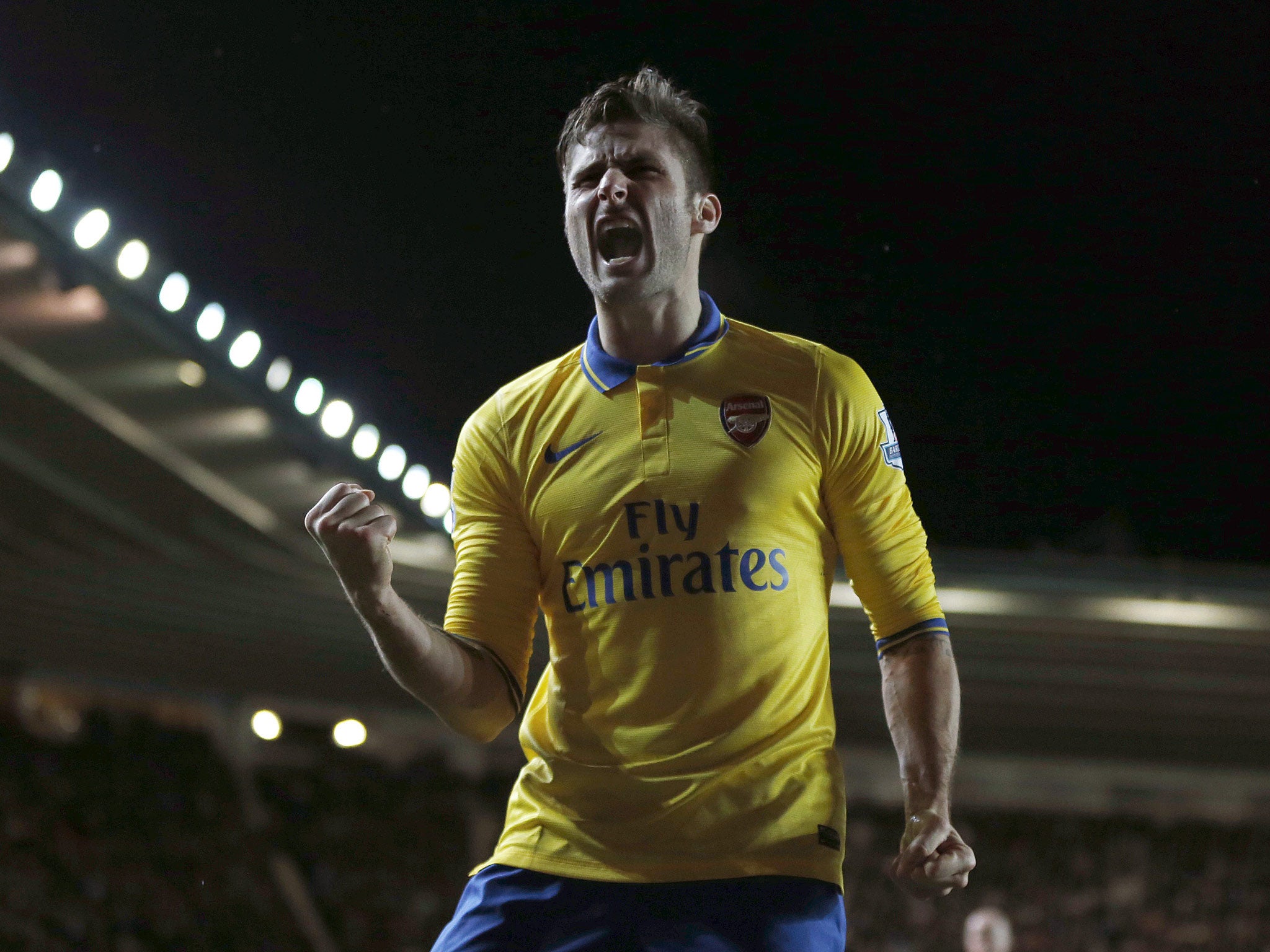 Arsenal's French striker Olivier Giroud celebrates scoring the equalising goal to make it 1-1