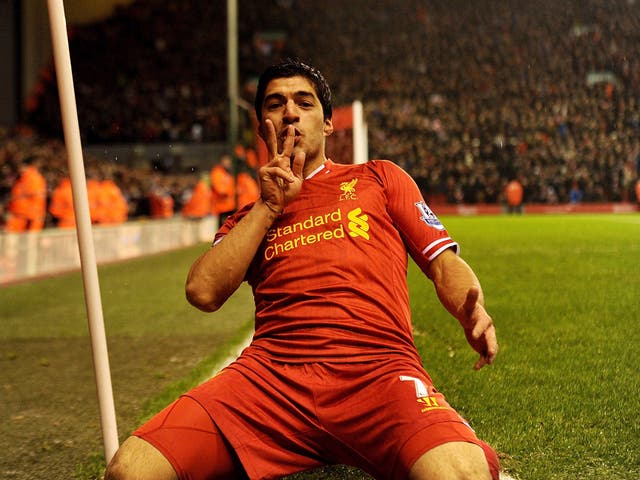 Luis Suarez of Liverpool celebrates his goal 