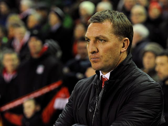 Liverpool manager Brendan Rodgers watches his side in the Merseyside derby