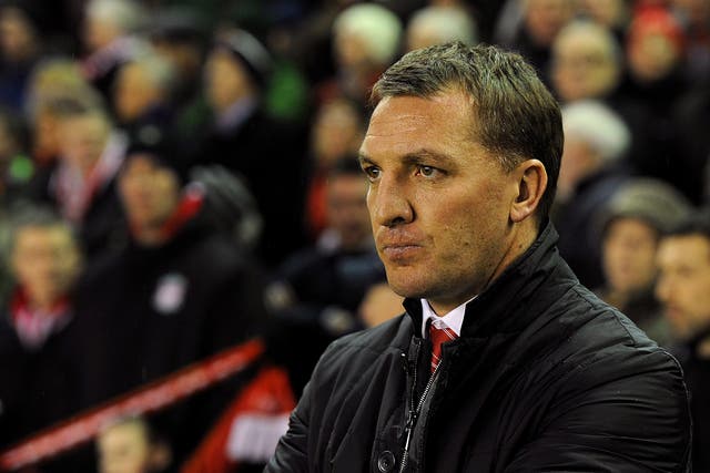 Liverpool manager Brendan Rodgers watches his side in the Merseyside derby